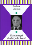 Kummargil käsikirjade kohal